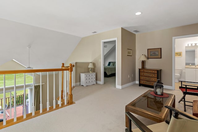 9 Sea Knoll Ct, Bourne, MA 02532 - sitting room with lofted ceiling, carpet, recessed lighting, and an upstairs landing