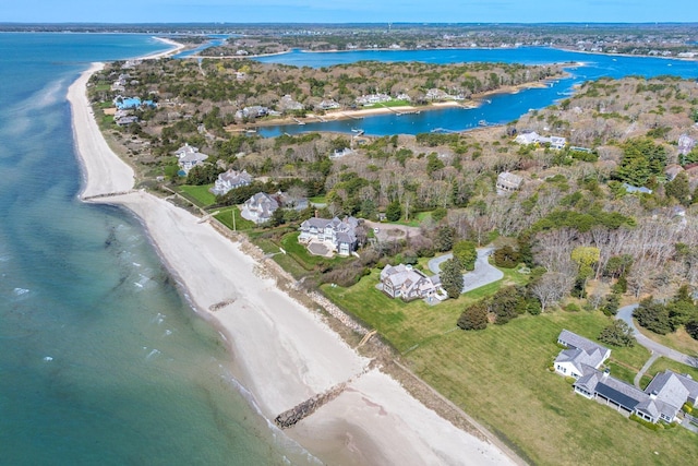 drone / aerial view featuring a water view and a residential view