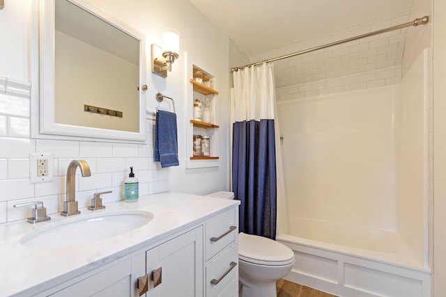 3 Bramblewood Ln, Orleans, MA 02653 - bathroom featuring wood finished floors, vanity, backsplash, and toilet