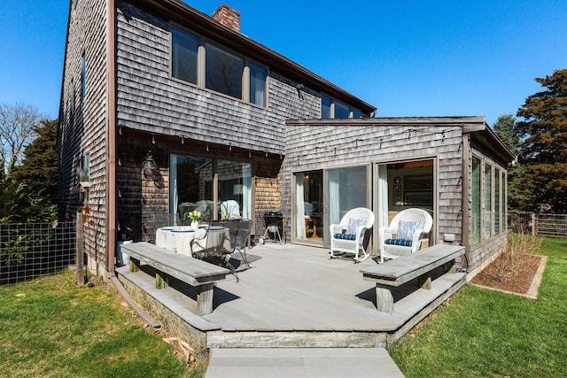 3 Bramblewood Ln, Orleans, MA 02653 - back of house with a chimney, fence, a deck, and a yard