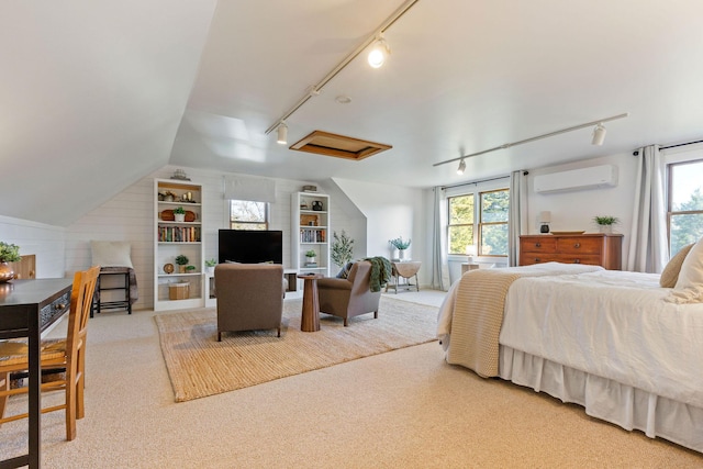 3 Bramblewood Ln, Orleans, MA 02653 - bedroom featuring attic access, track lighting, a wall mounted air conditioner, and multiple windows