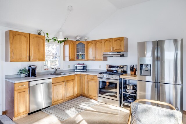 30 Overland Rd, Mashpee, MA 02649 - kitchen featuring stainless steel appliances, under cabinet range hood, light countertops, a sink, and high vaulted ceiling