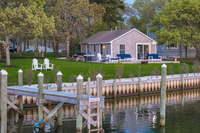 30 Overland Rd, Mashpee, MA 02649 - dock featuring a water view, a lawn, a patio area, and an outdoor living space