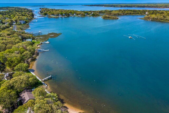 30 Overland Rd, Mashpee, MA 02649 - back of property featuring a water view and a lawn