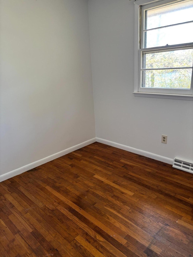83 Partridge Valley Rd, West Yarmouth, MA 02673 - empty room featuring baseboards and dark wood-type flooring