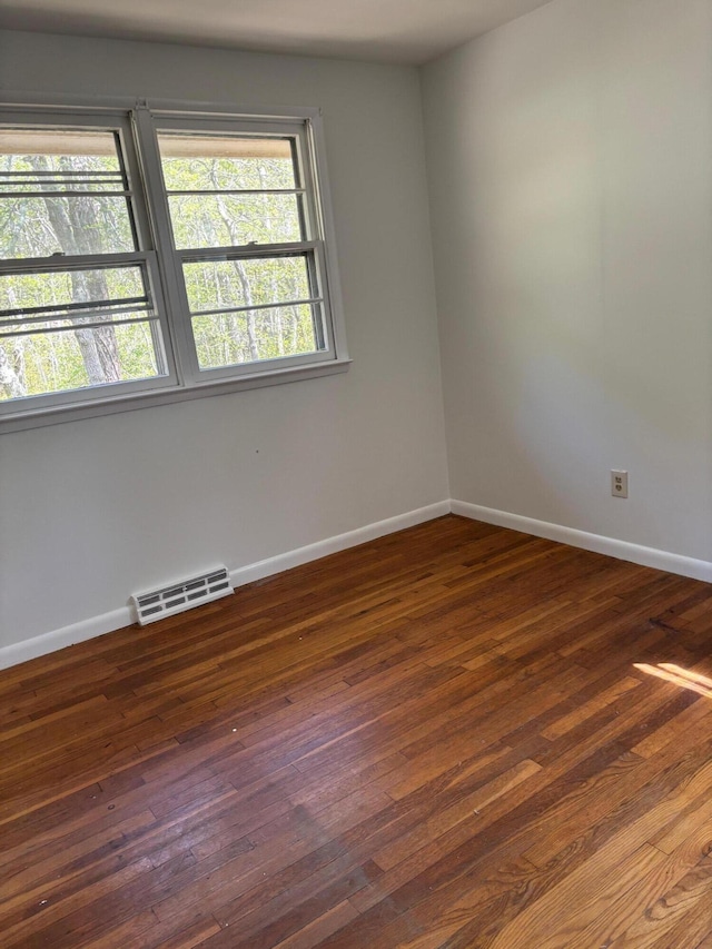 83 Partridge Valley Rd, West Yarmouth, MA 02673 - empty room with wood-type flooring and baseboards