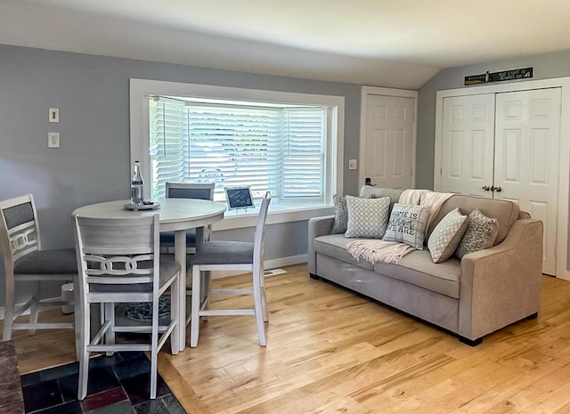 31 Northern Ave, Dennis Port, MA 02639 - dining area with light wood-style flooring, lofted ceiling, and baseboards