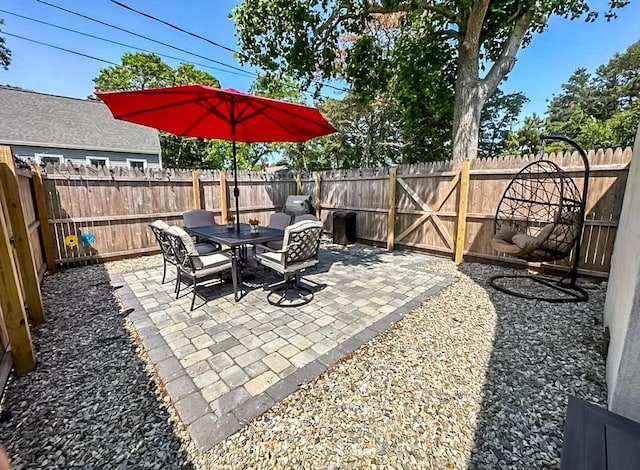 31 Northern Ave, Dennis Port, MA 02639 - view of patio with a fenced backyard and outdoor dining area