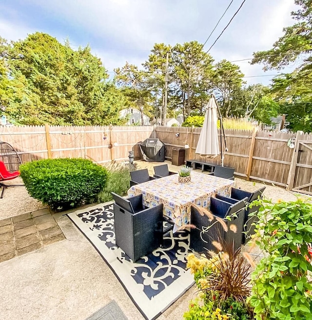 31 Northern Ave, Dennis Port, MA 02639 - view of patio with a fenced backyard and outdoor dining area