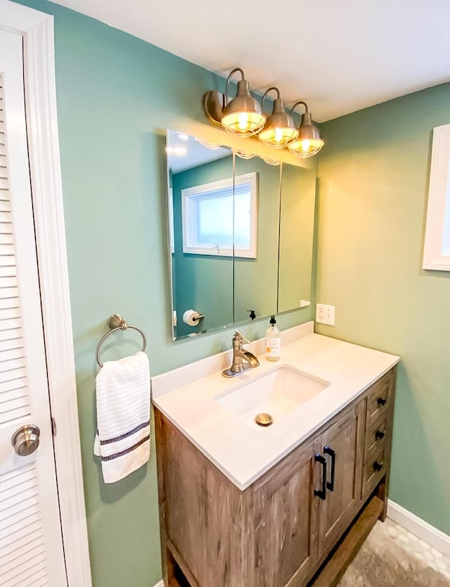 31 Northern Ave, Dennis Port, MA 02639 - bathroom with vanity and baseboards