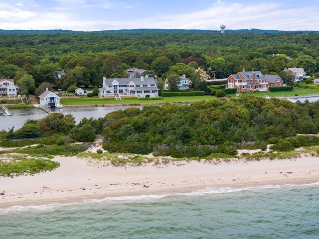 aerial view featuring a water view and a view of the beach