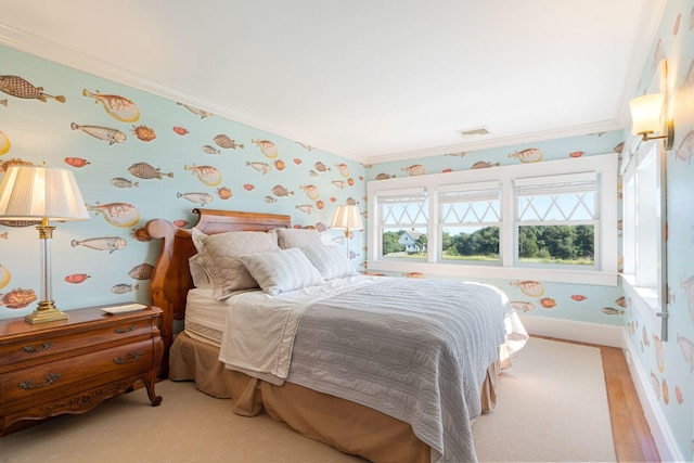 bedroom with ornamental molding