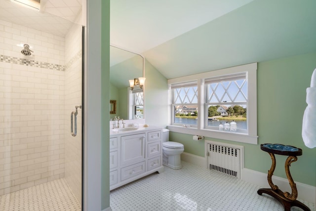 bathroom with radiator heating unit, an enclosed shower, a water view, vanity, and lofted ceiling