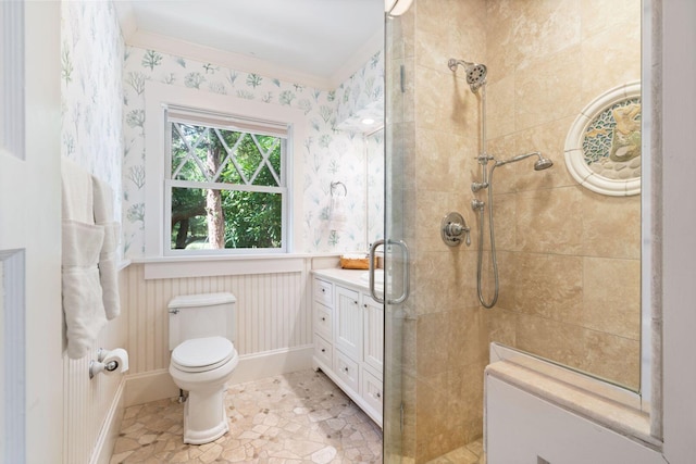 bathroom with vanity, toilet, and walk in shower