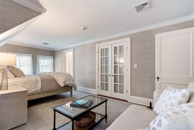 bedroom featuring crown molding and french doors