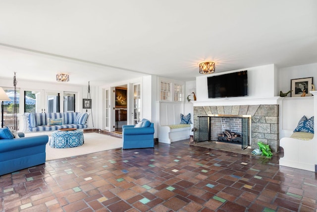 unfurnished living room featuring a fireplace