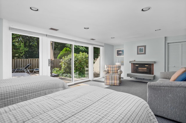 139 Prince Ave, Marstons Mills, MA 02648 - bedroom featuring access to exterior, carpet flooring, a fireplace, and recessed lighting