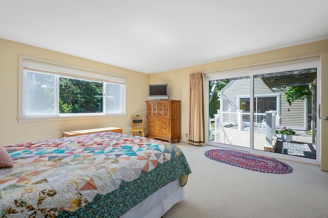 139 Prince Ave, Marstons Mills, MA 02648 - carpeted bedroom featuring access to outside and multiple windows