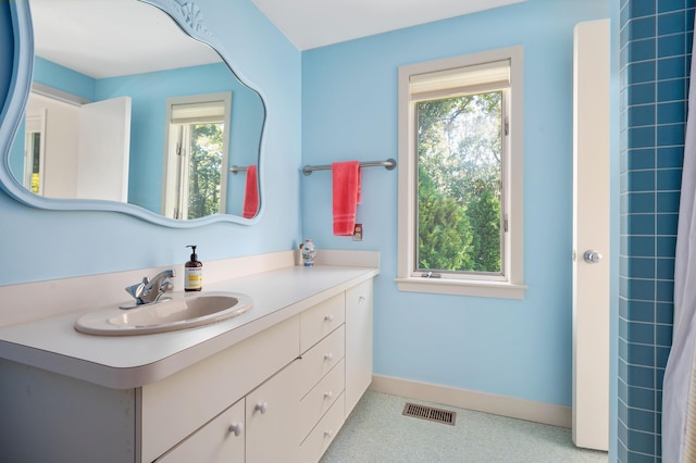 139 Prince Ave, Marstons Mills, MA 02648 - bathroom with vanity and baseboards