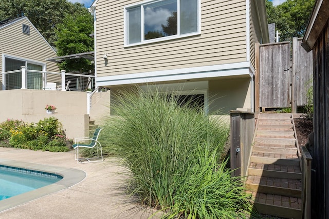 139 Prince Ave, Marstons Mills, MA 02648 - view of side of home featuring stairway and a patio