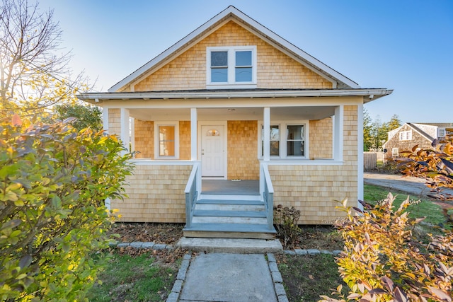 bungalow-style home with a porch