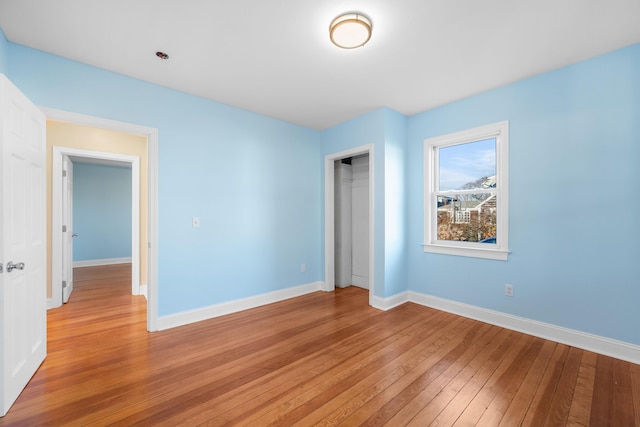 unfurnished room featuring light wood-type flooring