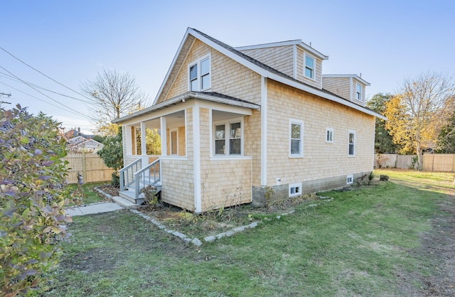 view of property exterior featuring a yard