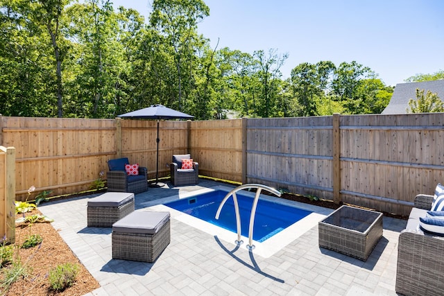 view of swimming pool with outdoor lounge area and a patio