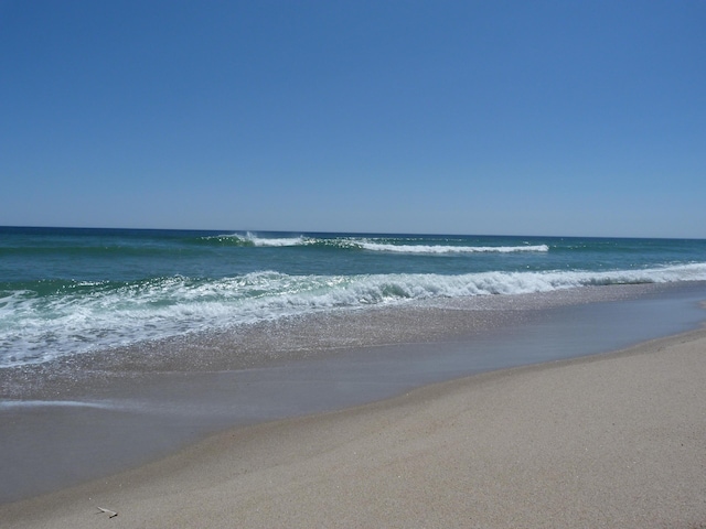 view of water feature with a view of the beach