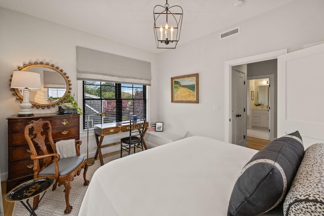 350 Bradford St Unit U7, Provincetown, MA 02657 - bedroom featuring a chandelier and connected bathroom