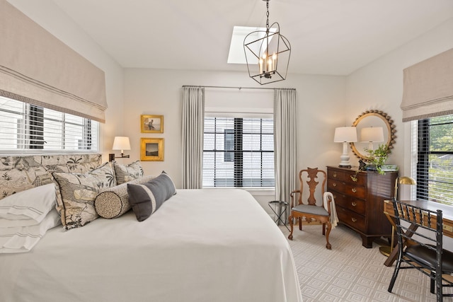 350 Bradford St Unit U7, Provincetown, MA 02657 - bedroom with a chandelier