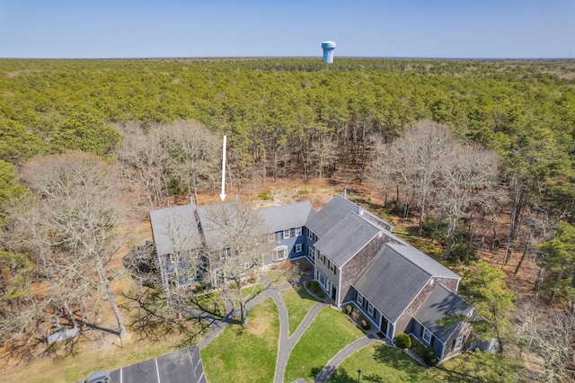 aerial view featuring a wooded view