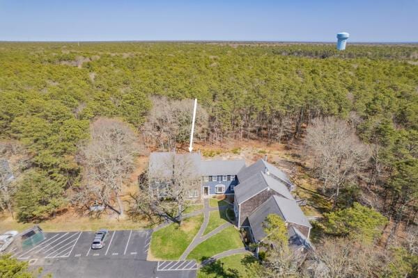 drone / aerial view with a view of trees
