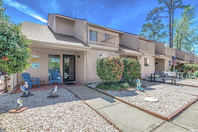 view of front of house with a patio