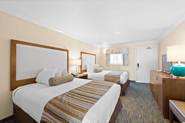 bedroom with crown molding and a textured ceiling