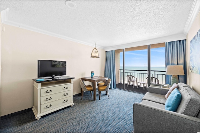 carpeted living room featuring a textured ceiling, a water view, and crown molding