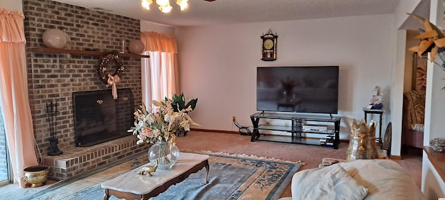 carpeted living room with a textured ceiling and a brick fireplace