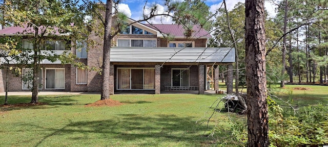 view of front facade featuring a front yard