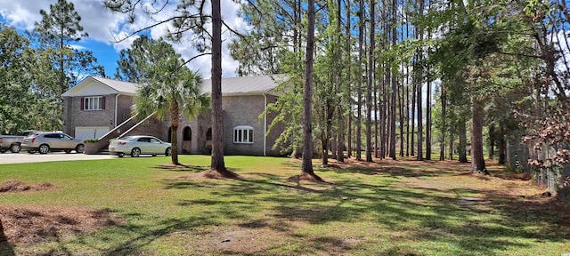 view of yard featuring a garage