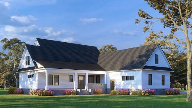 view of front of home with a front yard and covered porch