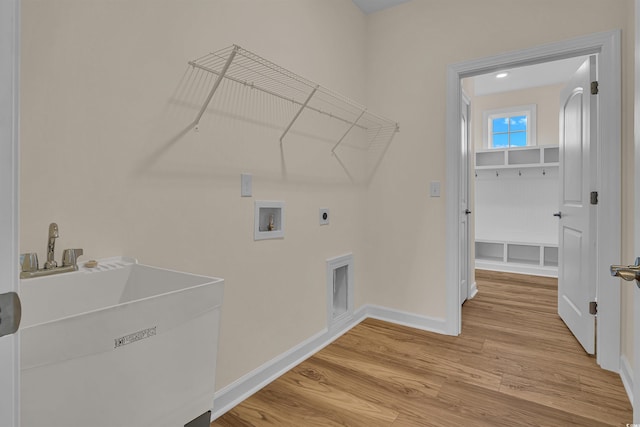 1228 Colusa Ct, Little River, SC 29566 - washroom featuring hookup for an electric dryer, washer hookup, and light wood finished floors