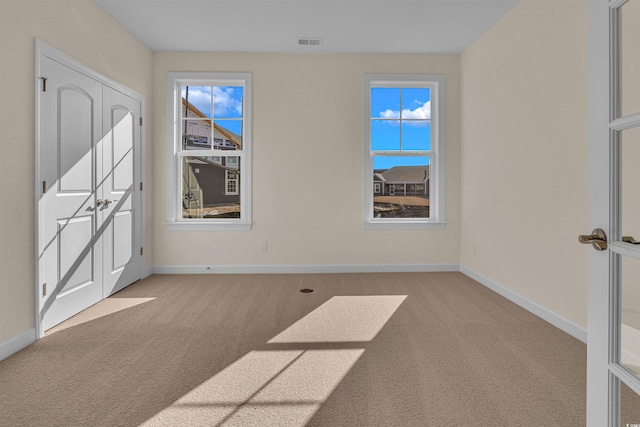1228 Colusa Ct, Little River, SC 29566 - spare room with light colored carpet and healthy amount of natural light