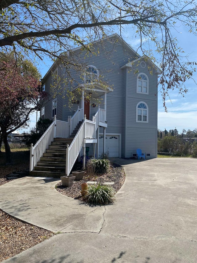 view of front of property with a garage