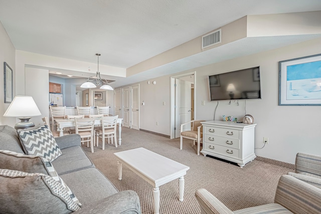 living room with light colored carpet