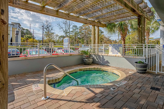 view of swimming pool with a pergola, a community hot tub, and a patio