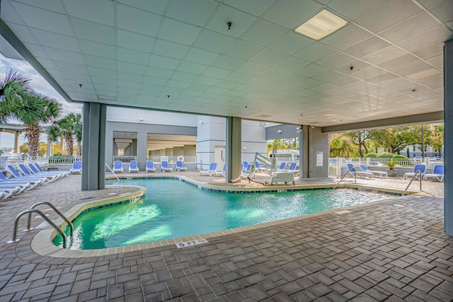 view of swimming pool featuring a patio