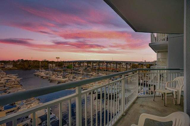 balcony at dusk with a water view