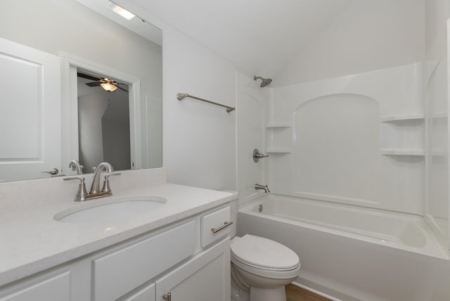 full bathroom featuring toilet, vanity, shower / bath combination, ceiling fan, and lofted ceiling