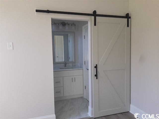 bathroom featuring tile floors and vanity