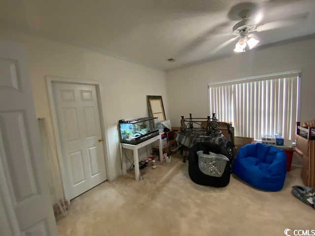 miscellaneous room with light colored carpet and ceiling fan